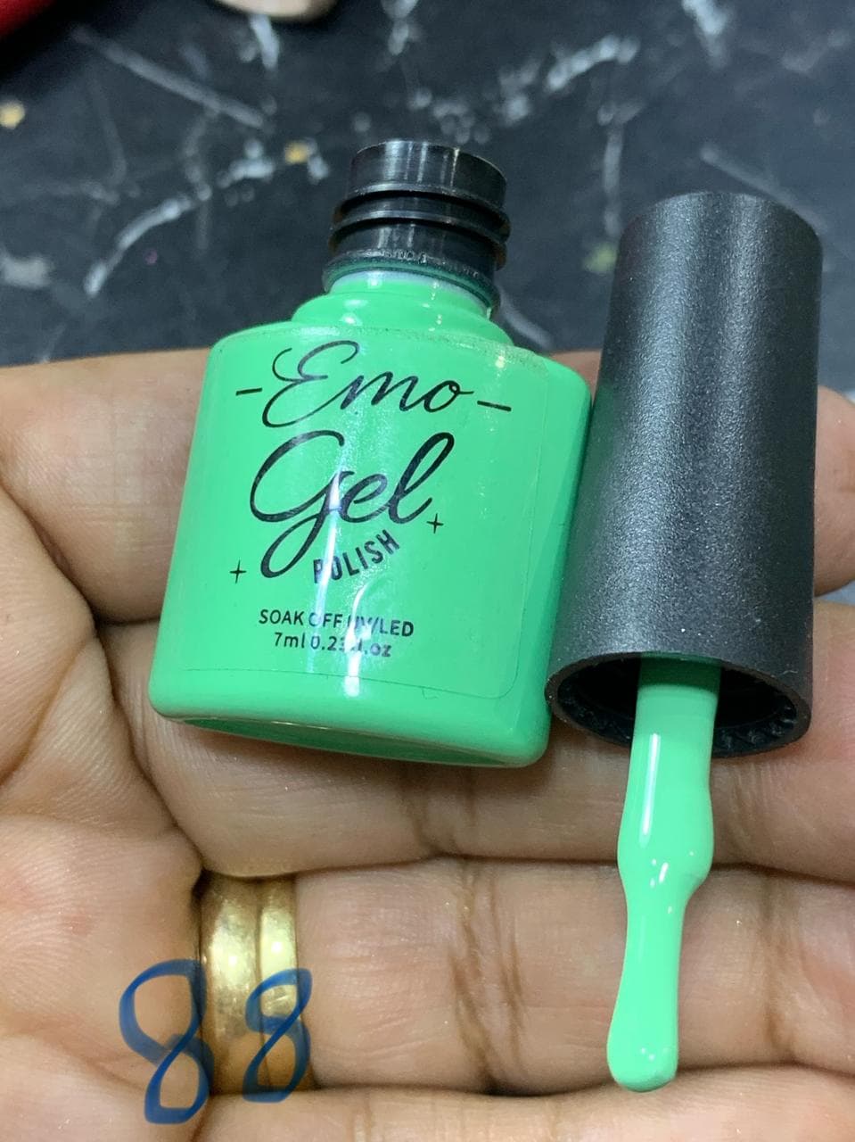 Aquamarine gel polish bottle