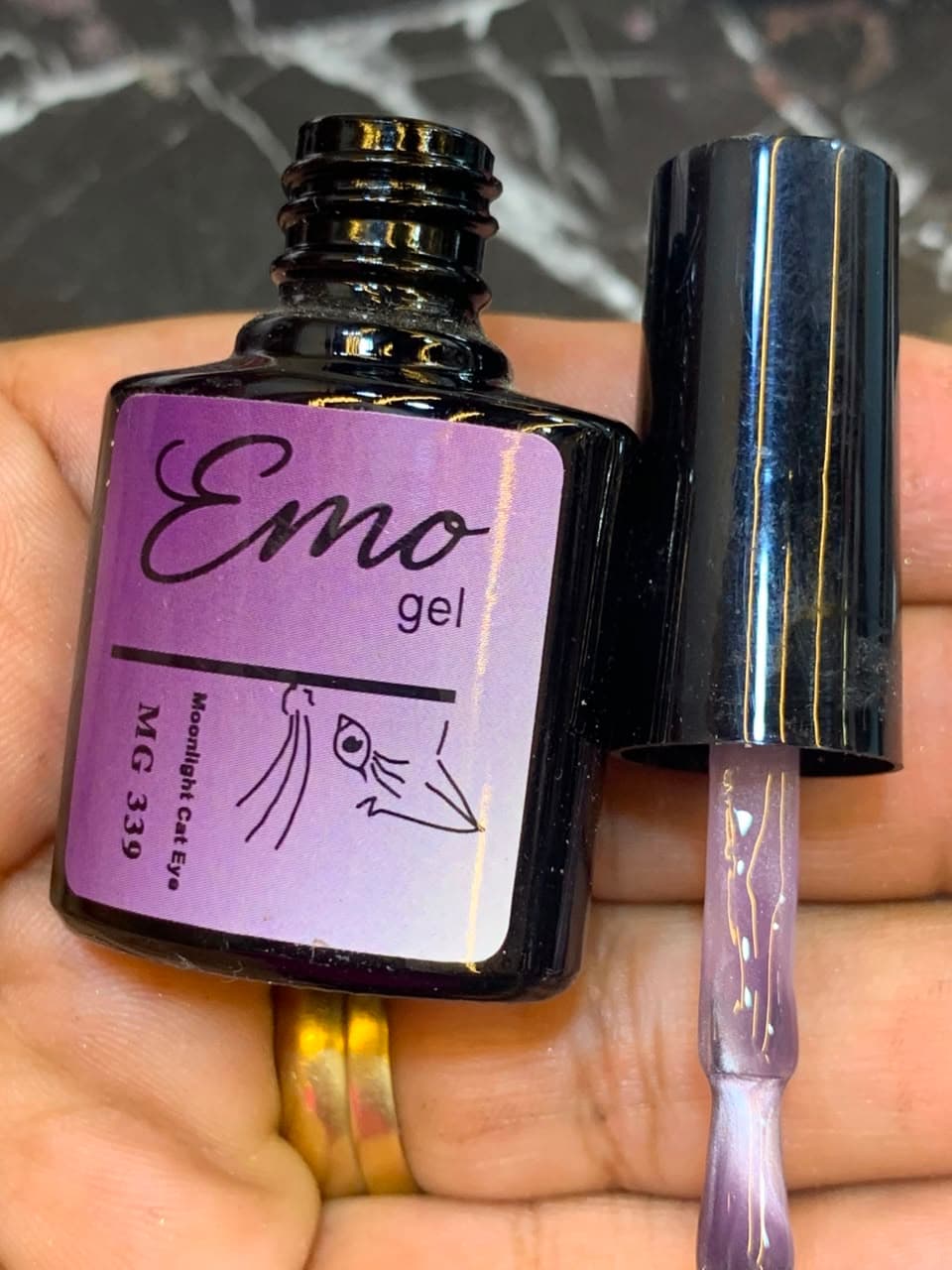 Lilac gel polish bottle